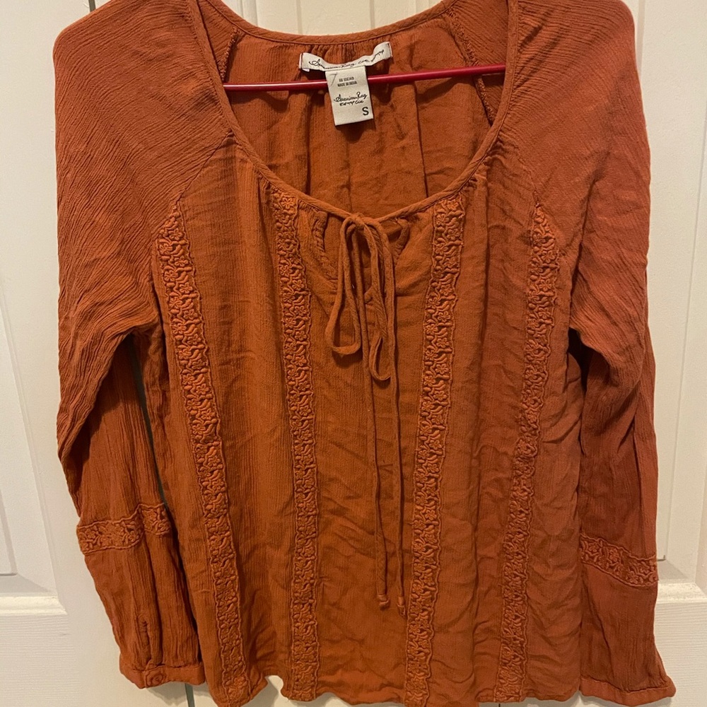 Burnt orange blouse